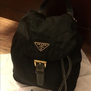 Used prada backpack with gold chain